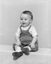 Photograph: [Toddler boy in overalls, boots and a short-sleeve shirt, 3]