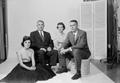 Photograph: [Four person family posing in a studio, 4]