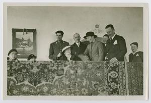 Primary view of object titled '[Alvin Owsley and his son in Queen Marie of Romania's box]'.