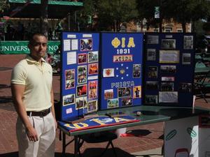 Primary view of object titled '[Phi Iota Alpha booth at 2013 Carnaval 2]'.