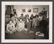 Photograph: [Group of individuals gathered in a room]