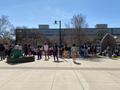 Primary view of [Crowd and Sister Cindy outside UNT Union]