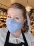 Thumbnail image of item number 1 in: '[Katy Allred wearing a face mask while working at LUCH in Houston]'.