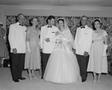 Photograph: [Newlyweds Glenella and Robert (Bob) Scarborough posing with their pa…