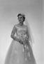 Photograph: [Portrait of Jane Williams in a wedding dress, holding a bouquet, sta…