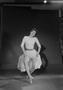 Photograph: [Photograph of Cherry Maddux posing in dance attire, holding her skir…