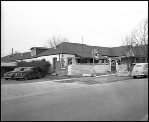 Primary view of object titled '[Pontiac Authorized Service Business in Denton Area, 1942]'.