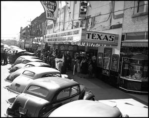 Primary view of object titled '[Theater Row in Denton Texas, 1942]'.