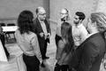 Photograph: [John W. Richmond talking with Evan Adams, Brennan Pierce, Grant Carr…