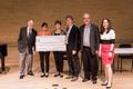 Photograph: [Jennifer Guzman with judges and faculty at the UNT Music Entrepreneu…