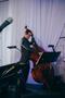 Photograph: [Cello player performing a reception for the UNT College of Music Gal…