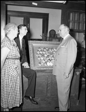Primary view of object titled '[President Matthews at a Homecoming event]'.