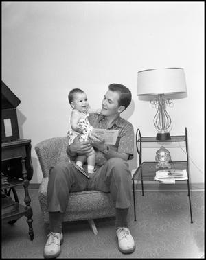 Primary view of object titled '[Photograph of Pat Boone and one of his daughters]'.