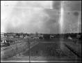 Thumbnail image of item number 1 in: '[Campus - Aerial - View Across Fields and Houses to Denton Courthouse]'.