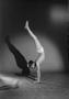 Photograph: [Portrait of Ronald (Ronnie) R. Zodin doing a handstand]