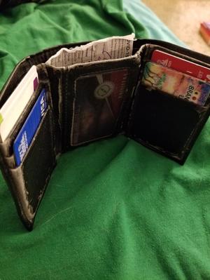 Primary view of object titled '[Wallet with COVID-19 vaccination card]'.