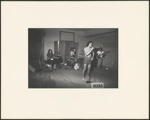 Primary view of object titled '[A male band perform indoors]'.