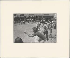 Primary view of object titled '[Young boys playing a game on the Denton Square]'.