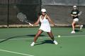Photograph: [Idalina Franca swings racket during tennis match, 2]