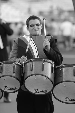 Primary view of object titled '[Percussionist performs with UNT marching band]'.