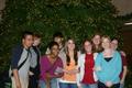 Photograph: [Students pose in front of tree at UNT Tree Lighting Ceremony]