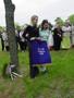 Photograph: [Women hold 'Collin County SAR' banner at John Abston graveside cerem…