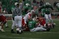 Photograph: [UNT and WKU players on the ground during a football game]