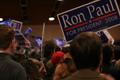 Photograph: [Photograph of a crowd holding Ron Paul signs]