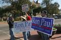 Primary view of [Photograph of a group holding Ron Paul signs on the Square]
