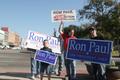 Photograph: [Photograph of a group holding Ron Paul signs on the Square 3]