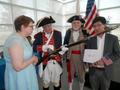 Primary view of [TXSSAR member displays musket at naturalization ceremony: September 6, 2018; 2]