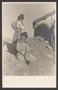 Postcard: [Two girls on a rocky hill]