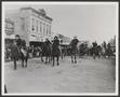 Thumbnail image of item number 1 in: '[Men riding horses down the street]'.