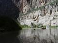 Photograph: [People canoe in Big Bend canyon mouth]