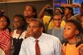Photograph: [Marcus Moore with students at WFAA, 2]