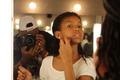 Primary view of [Girl applies stage makeup at 2016 TBAAL Summer Youth Arts Institute]