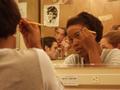 Thumbnail image of item number 1 in: '[Actor 2 applies stage makeup]'.