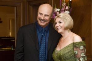 Primary view of object titled '[Gretchen Bataille and Dr. Phil at inauguration reception]'.