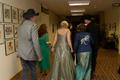 Primary view of [Gretchen Bataille and others walk through UNT Union, 2008 Emerald Ball]