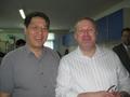 Thumbnail image of item number 1 in: '[Two men in lab during UNT delegation visit to China]'.