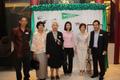 Photograph: [Group photograph with Pornpun Waitayangkoon at UNT alumni party in B…