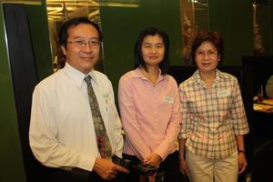 Primary view of object titled '[Anuwat, Sirikul, and Nanta at UNT alumni party in Bangkok]'.