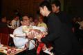 Photograph: [Vish Prasad with Thai puppet during performance]