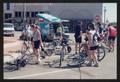Primary view of [Cyclists arriving to Decatur pit stop: Lone Star Ride 2002 event photo]