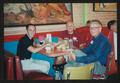 Photograph: [Three men eating at a restaurant booth table: Lone Star Ride 2003 ev…