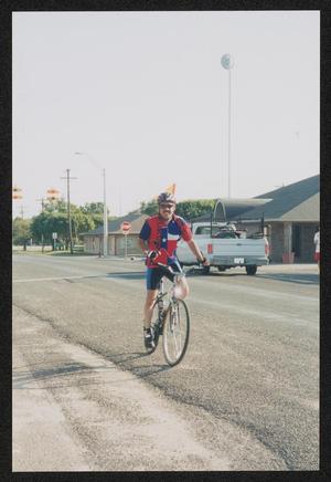 Primary view of object titled '[Rider wearing a Texas cycling jersey: Lone Star Ride 2003 event photo]'.