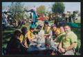 Thumbnail image of item number 1 in: '[Group of 7 sitting around a table eating lunch: Lone Star Ride 2003 event photo]'.