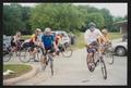 Thumbnail image of item number 1 in: '[Riders turning a corner as a group: Lone Star Ride 2004 event photo]'.