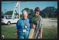 Photograph: [Smiling volunteer duo: Lone Star Ride 2004 event photo]