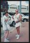 Photograph: [Volunteer duo in togas: Lone Star Ride 2004 event photo]